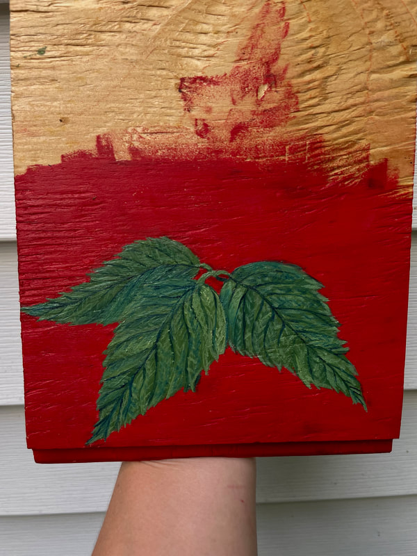 Poison ivy leaf painted on red background