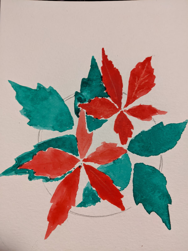 Red Virginia-creeper leaves with green poison ivy leaves in the background