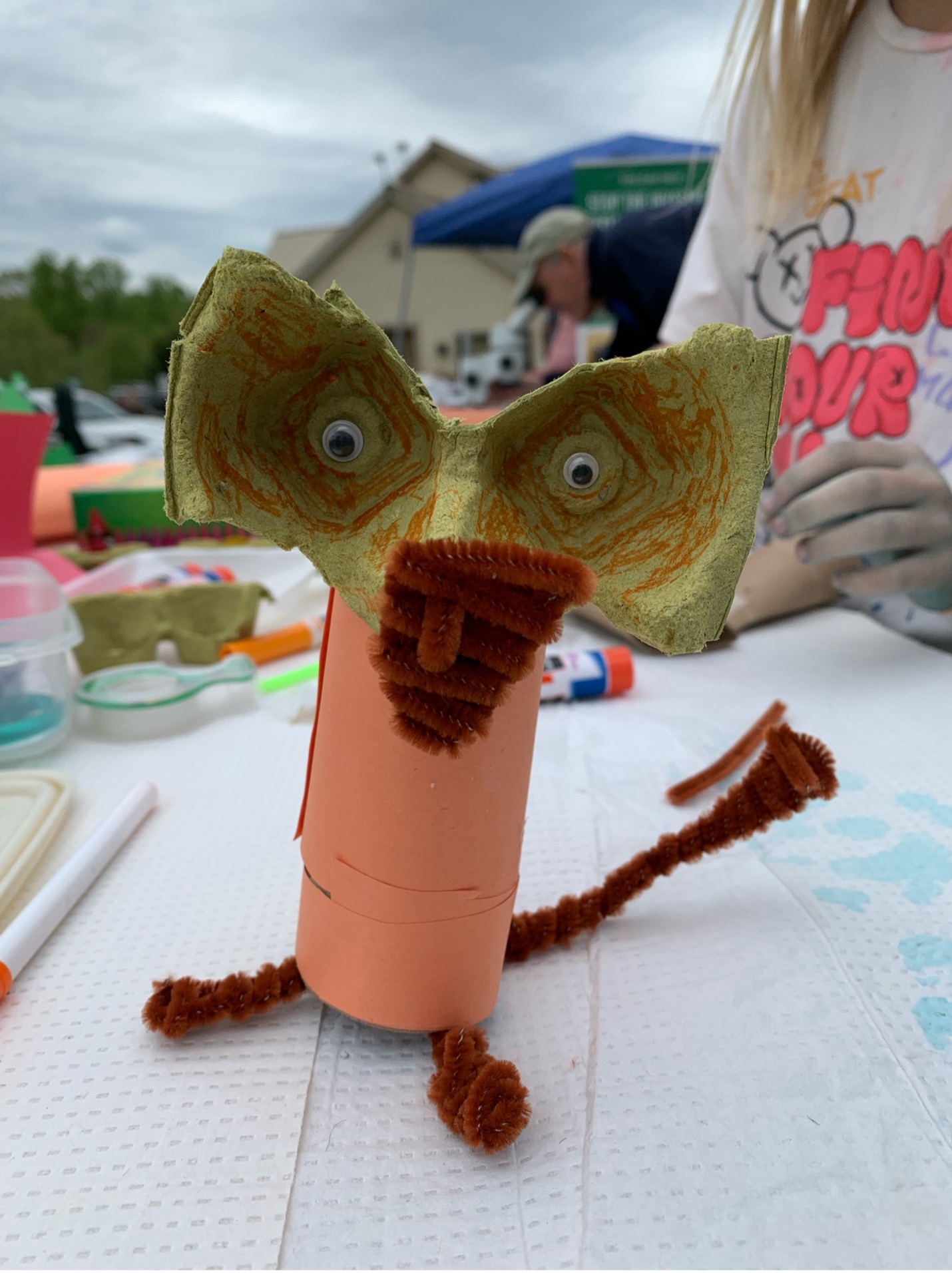 creature that looks like a fox made from cardboard and pipe cleaners